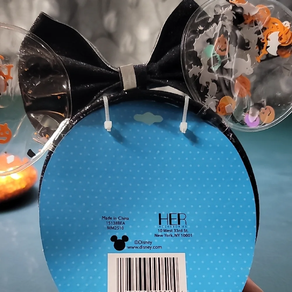 **Disney Sparkling Orange Minnie Ears with Black Bow**